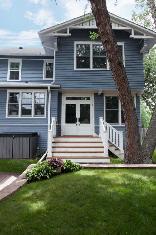 Professional design-build transforms Craftsman residence, integrating updated exterior elements.