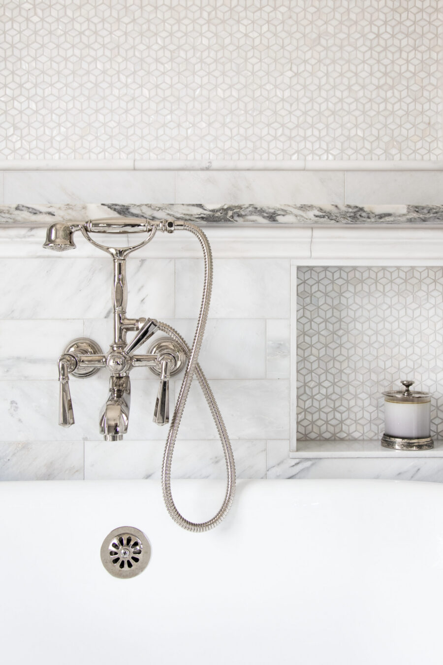 Bathroom remodel: polished chrome, marble, geometric mosaic, Twin Cities.
