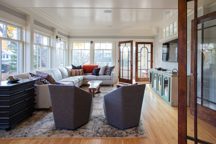 Sunlight illuminates this expansive Twin Cities living room's modern renovation.