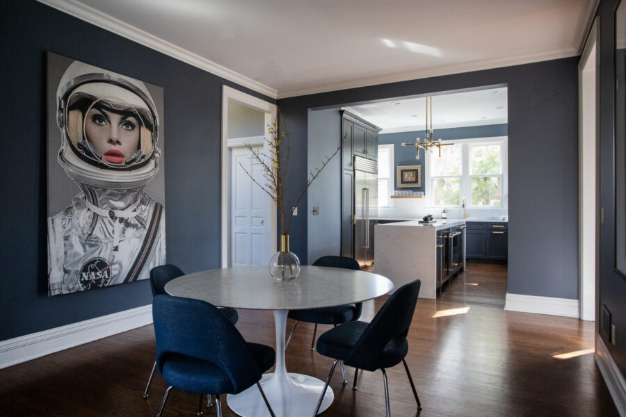Charcoal dining area transitions into modern kitchen renovation, Twin Cities home.