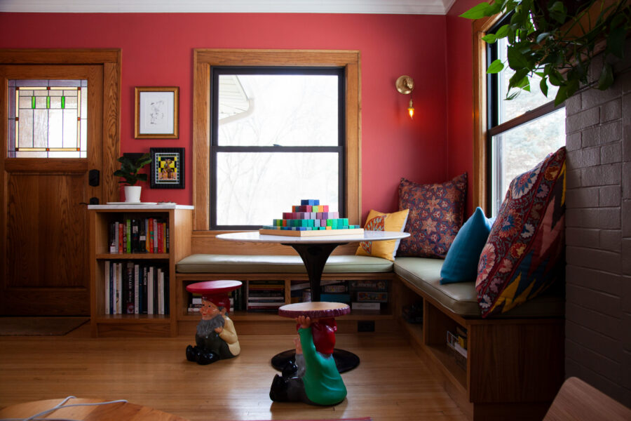 Vibrant red custom-built Twin Cities banquette nook, hardwood, home renovation.