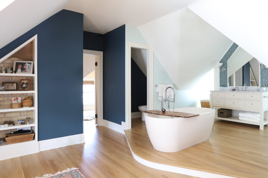 Twin Cities design-build transformed master bathroom: freestanding tub, blue mosaic.