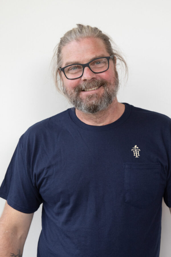 Brilliant interior illumination highlights impeccable white wall for quality renovations.