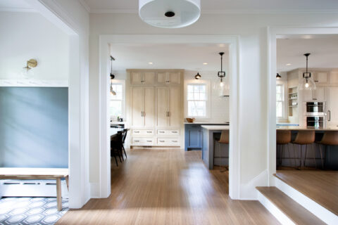 Design build kitchen interior showcasing custom cabinetry craftsmanship with seamless architectural transitions and refined material detailing