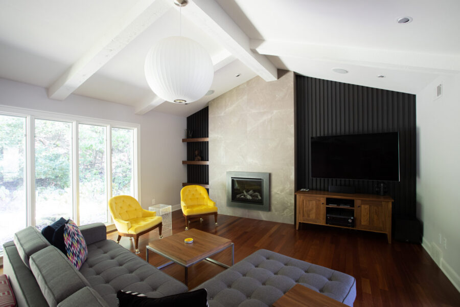 Twin Cities home renovation features vaulted ceilings, marble fireplace.